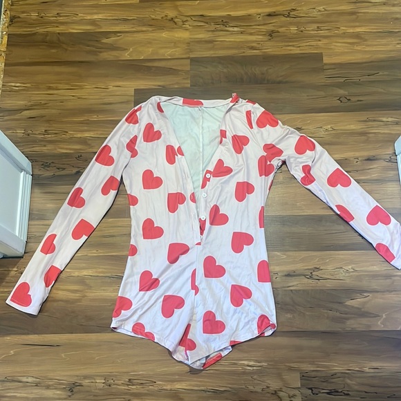 Cute pyjamas with “peachy” on bum. - Picture 1 of 3